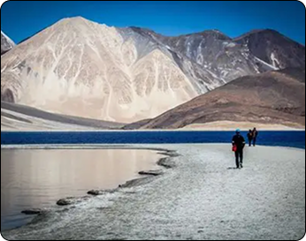 Pangong Lake shoreline and Himalayan mountain peaks in Ladakh
